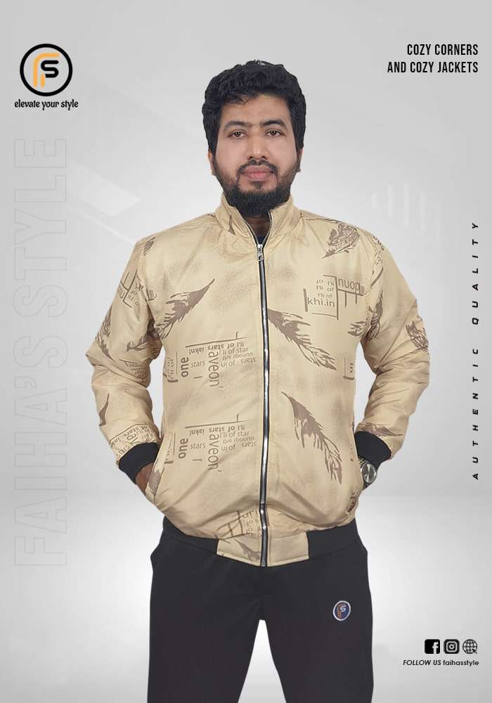 Biscuit jacket with brown graphic accents worn by a man standing with hands in pockets. Promotional text "Cozy Corners and Cozy Jackets" is visible, with a subtle brand watermark in the background.