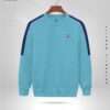 Light Blue crewneck sweatshirt with Petrol contrasting sleeves, a small embroidered 'F' logo on the chest, and a ribbed hem and cuffs.