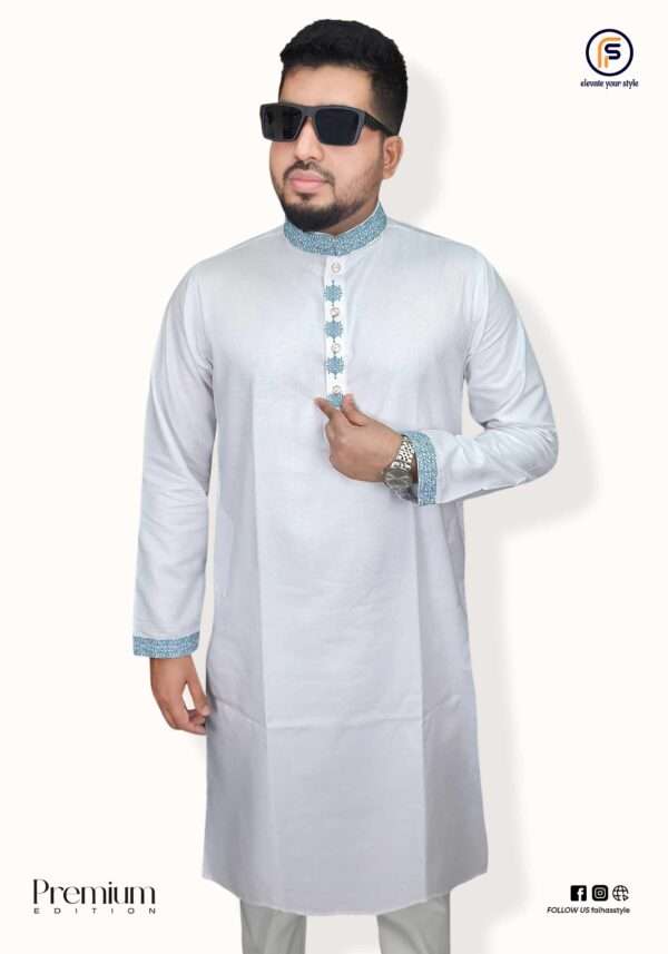 Faiha's Special Gold Edition shirt is crafted from premium cotton — celebrated for its smooth texture, soft feel, and all-day breathability. A perfect choice for the modern man who values both comfort and refined style. Fabric: Premium Cotton Body: Exclusive Gold Edition with Intricate Embroidery Finish Collar: Classic Structured Collar Placket: Straight Front Placket with Embroidered Details Sleeve: Full Sleeve with Embroidered Cuff Detailing Cuff: Stylish Embroidery Cuff Detailing Fit: Regular Comfortable Fit Colors: White | Black | Purple Sizes: 40 | 42 | 44 | 46 Buttons: Imported Snap Button Closures